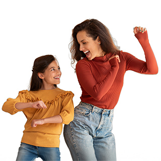 a mother and daughter dancing